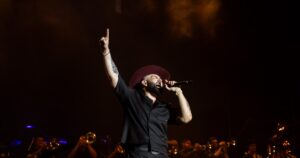 Carin Leon performing with a brass section at Nu Stadium, Miami. Events, GCC Media.